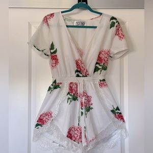 Xenia floral romper with lace detail adjustable waist